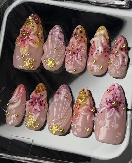 Pink Seashell press-on nails by Atrangi Tips